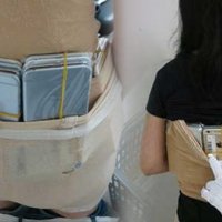 Çinli kadın 102 iPhone'u vücuduna zulaladı